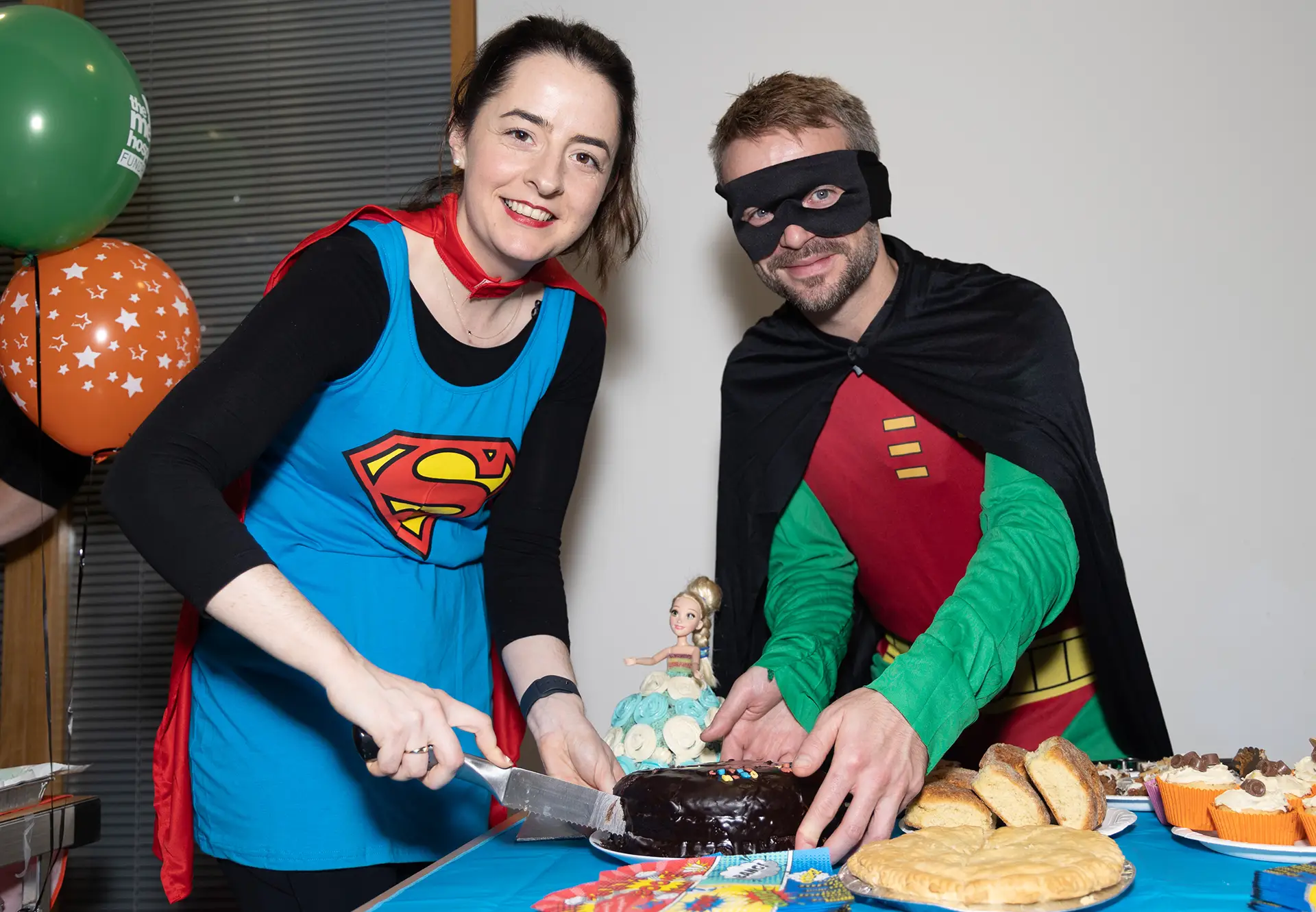 Two fundraisers dressed as superheroes